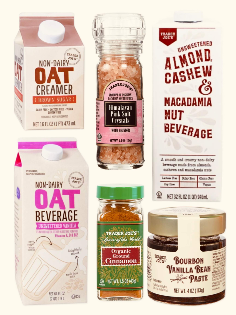 Flat lay of Trader Joe’s Dairy-Free Coffee ingredients including oat milk, non-dairy creamer, cinnamon, vanilla bean paste, and Himalayan salt.